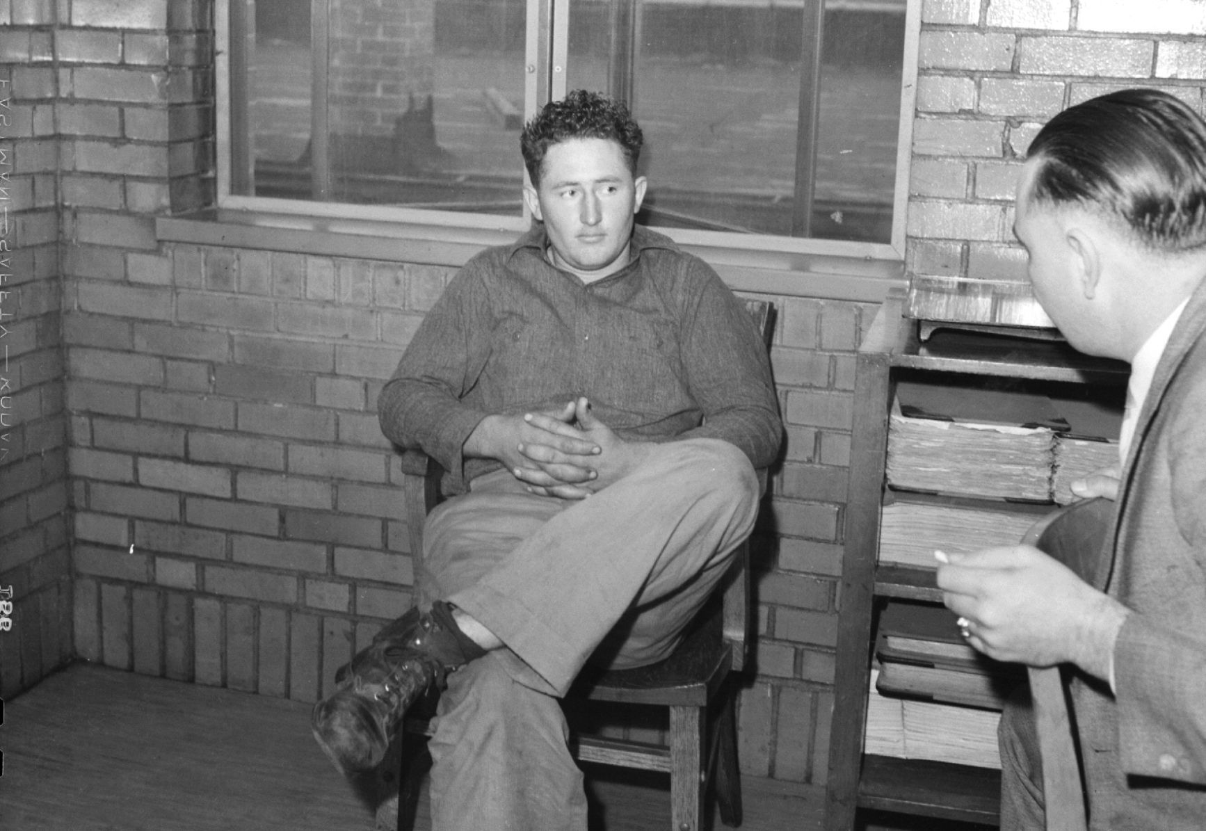 McWha held by police